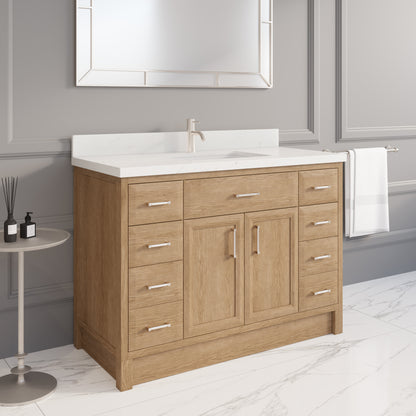 Meuble-lavabo simple Capri III avec organiseur Stealth, armoire de salle de bain en bois massif avec comptoir et dosseret en pierre reconstituée, porte et tiroir à fermeture amortie, pré-assemblé