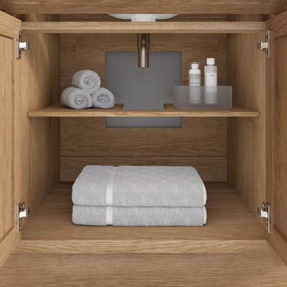 Meuble-lavabo simple Capri III avec organiseur Stealth, armoire de salle de bain en bois massif avec comptoir et dosseret en pierre reconstituée, porte et tiroir à fermeture amortie, pré-assemblé